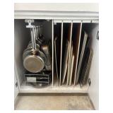 Large assortment of kitchen wares including pots,