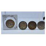 Two 1964, 1969 and 1977 U.S.A. Half Dollar Coins