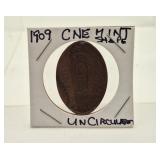 1909 CNE Uncirculated Mint shape Penny Token