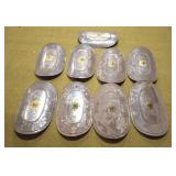 9 ceremonial tin shields