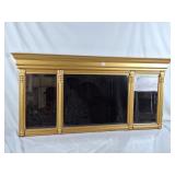 Elegant Bombay Mirror with small ledge.