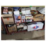 2 shelves of contents! Saws, board games, tins,