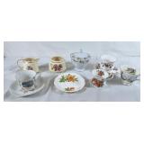 Covered candy dish, cream & sugar dish, tea cups,