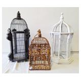 Trio of bird cages