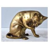 Realistic Brass Cat Licking His Paw Doorstop