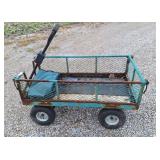 4 wheel cart. Box measures 40" l x 21" w x 11" h