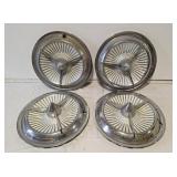 4 vintage spinner hub caps