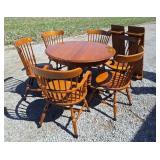 Elegant Maple dining room table with 6 chairs and