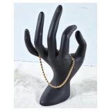 14K Gold rope bracelet. Marked silk rope