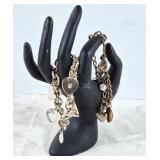 Pair of charm bracelets. Unmarked