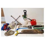 Saws, tire iron, spot sprayer, gas can, gloves,