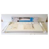 IKEA floating shelves and Taymor expandable