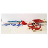 Trio of umbrellas, roller gard, and radio flyer