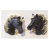 Pair of vintage horse head wall plagues 1 has a