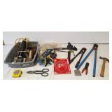 Bolt cutters, hammer, clips, tape measures, tin
