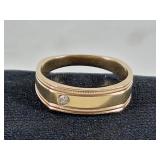 14K Ring with 1 tested diamond. Size 12.5