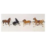 4 collectible horses. 2 marked Japan 1 has a