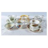 4 matching tea cups & saucers and 1 cream & sugar