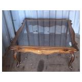 Glass top coffee table.