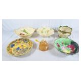 Assorted floral bowls, jardiniere, and honey