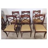 6 dining chairs. 2 being captain