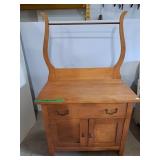 Vintage washstand has harp-shaped towel rack