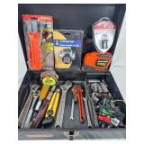 Tool box full of various tools, wrenches, tape