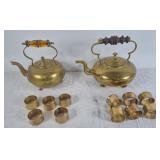 Brass kettles and napkin ring holders
