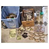 Assorted brass hardware, switch covers, and much