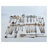 Assorted flatware! Spoons, serving spoons, forks,