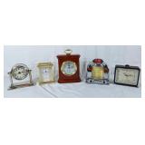 4 mini clocks and 1 radio. Bulova, sky timer, etc