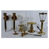 Lot of brass candle holders, snuffer and a