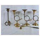 Lot of brass candle holders and one snuffer,