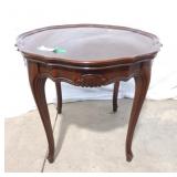 Vintage mahogany side table with carved cabriole