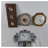 3 wall clocks and barometer