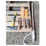 Log roller, metal wedges, axe, and plastic wedges