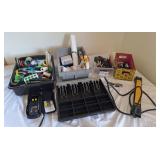 Office supplies, cash box, and assorted tools