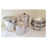 Stainless mixing bowls and trio of pots