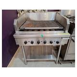 Quest commercial charbroiler. Gas