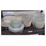 Assorted serving plates and bowls. Various sizes