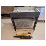 Gas stove with wooden frame.