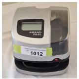 Amano PIX-55 electronic time clock. Powers on