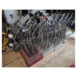 4 stands with assorted golf clubs (45)