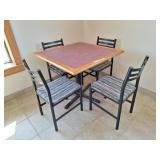 Restaurant table with 4 chairs.