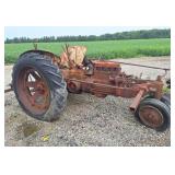 Case tractor with row crop cultivator