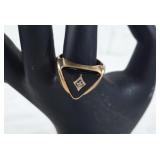 Elegant 10K ring with small diamond