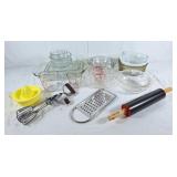Various casserole dishes, measuring cups, rolling