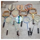 Lot of tennis and badminton rackets