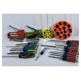 Lot of craftsman screwdrivers, staplers, guitar