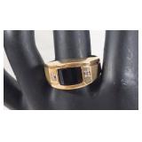 Gorgeous 10K ring with black onyx and 2 diamonds.